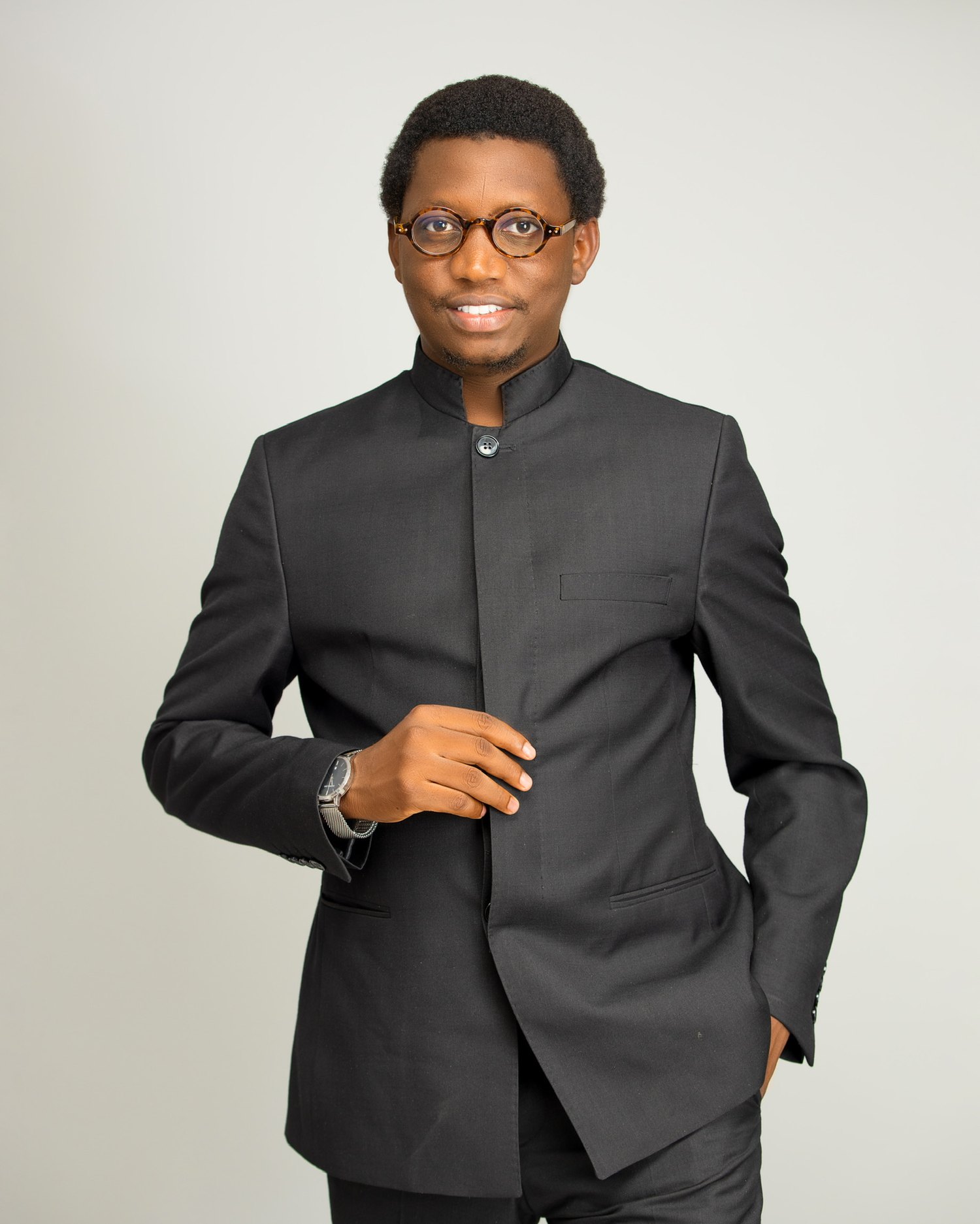 Official portrait of Yusuf Garba in black